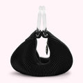 Black pleated handbag with clear acrylic handles.