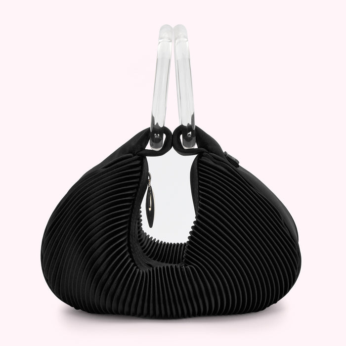 Black pleated handbag with clear acrylic handles.