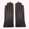 Pair of black leather gloves with silver studs.