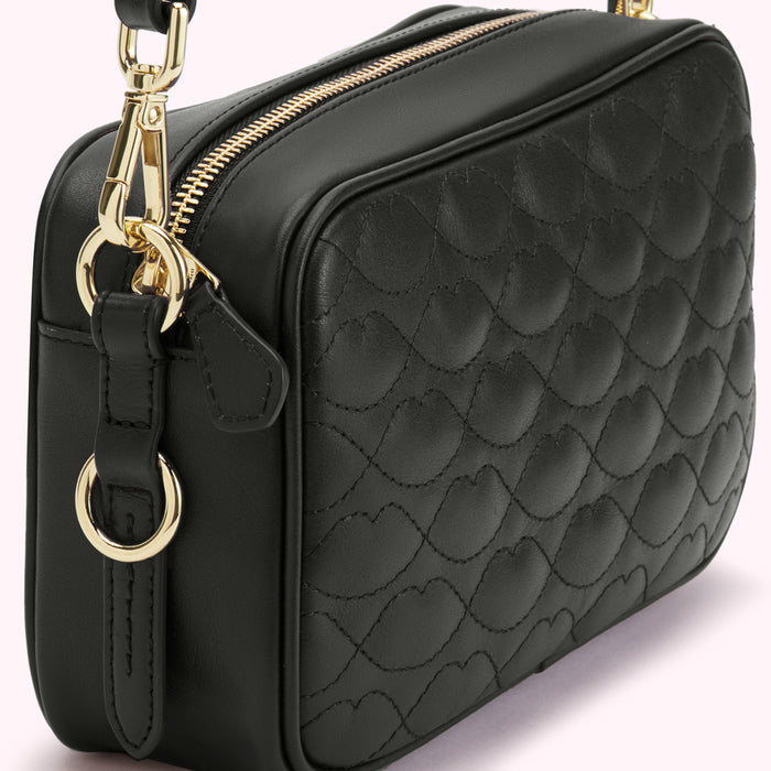 Black quilted crossbody bag with gold-tone hardware.