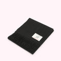 Black Lulu Guinness wool scarf with a small white label that says "Made with Love".