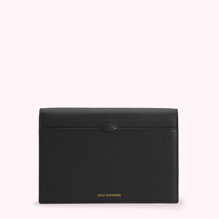 Black Lulu Guinness leather wallet on a white background.