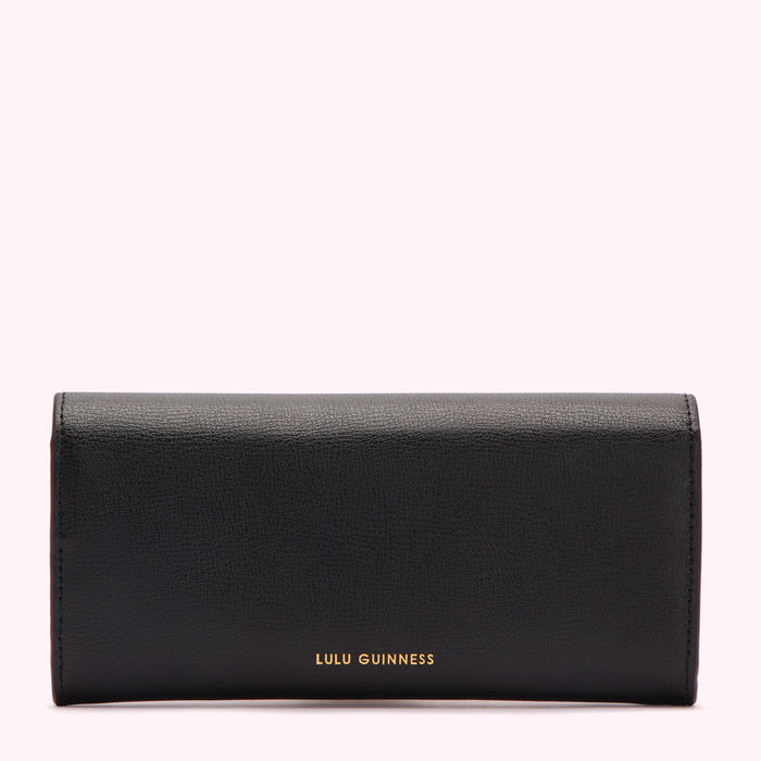 Black Lulu Guinness wallet on white background.