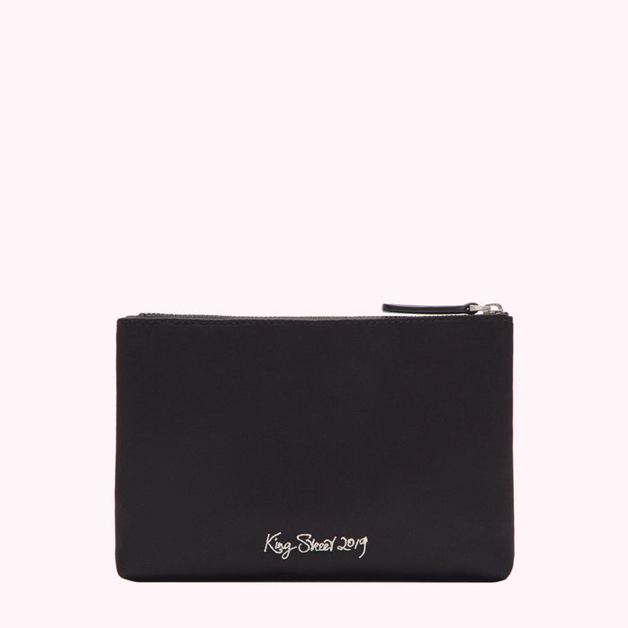 Black zipper pouch with "King Street 2019" embroidered in white.