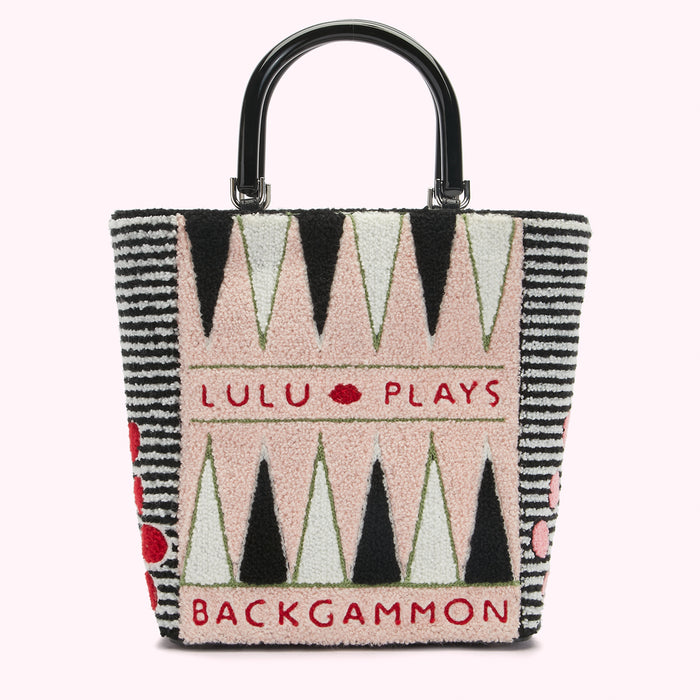 Pink, black, and white embroidered backgammon tote bag with black handles. The text "Lulu Plays Backgammon" is embroidered on the bag.