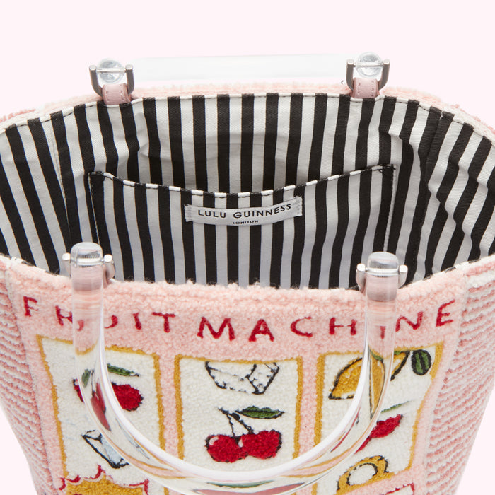 Pink Lulu Guinness Fruit Machine tote bag with clear Perspex handles, black and white striped interior.