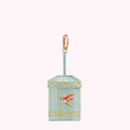 Light teal birdcage-shaped keychain with a gold clasp and a small red and yellow bird inside.