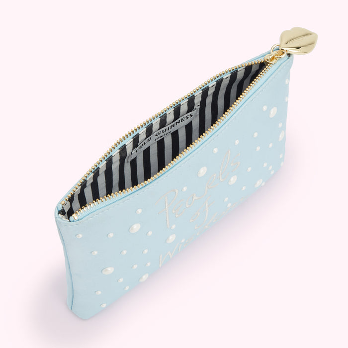 Light blue zip pouch with pearls and the words "Pearls of Wisdom" in white script. The inside lining is black and white striped. A gold zipper pull shaped like a lip.
