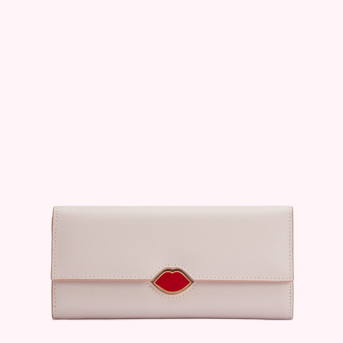 Pale pink leather wallet with a red lip emblem.