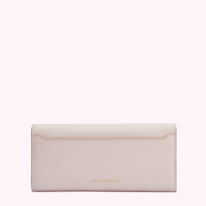 Light pink Lulu Guinness wallet, back view.