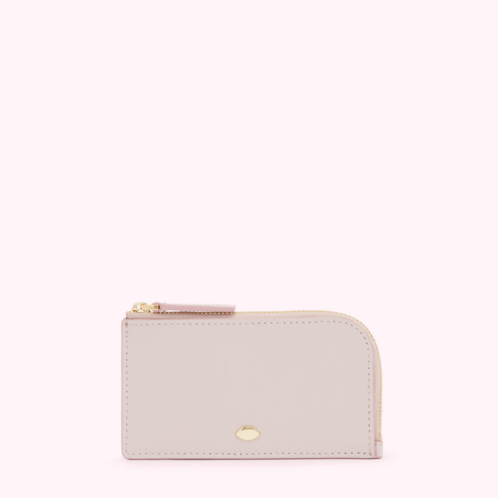 Pale pink leather zip-around cardholder with gold zipper and hardware.