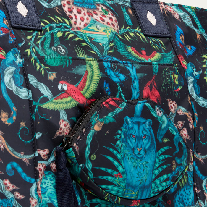 Colorful patterned bag  by Lulu Guinness x Emma Shipley with animals and plants on a dark background
