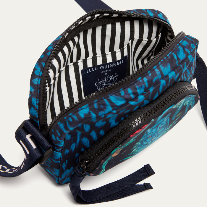 Blue patterned bag  by Lulu Guinness x Emma Shipley with striped print lining and Lulu Guinness label.