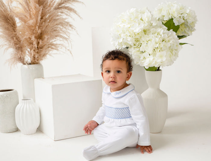 Boys Personalised Smocked baby grow - White trimmed with Blue