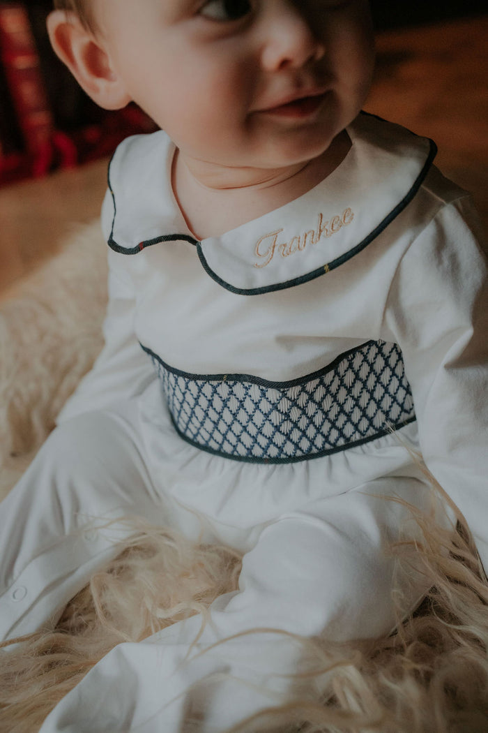 Boys White Personalised Smocked Babygrow Trimmed With Royal Navy Tartan