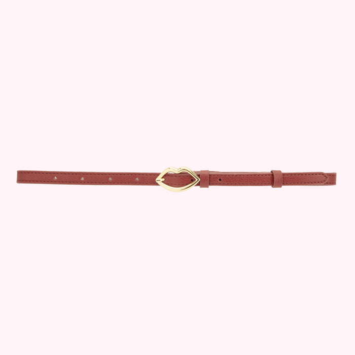 Tan brown leather belt showing a gold lip shaped buckle.