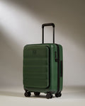 a green suitcase with wheels