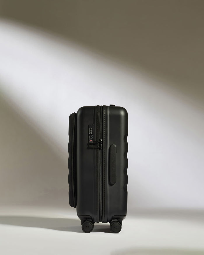a black suitcase with wheels