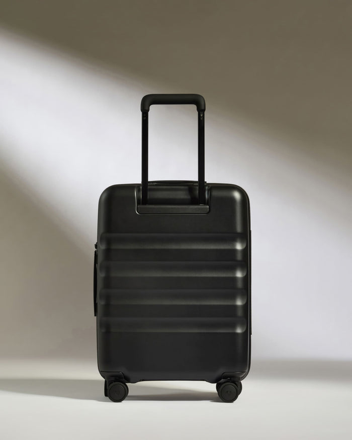 a black suitcase with wheels