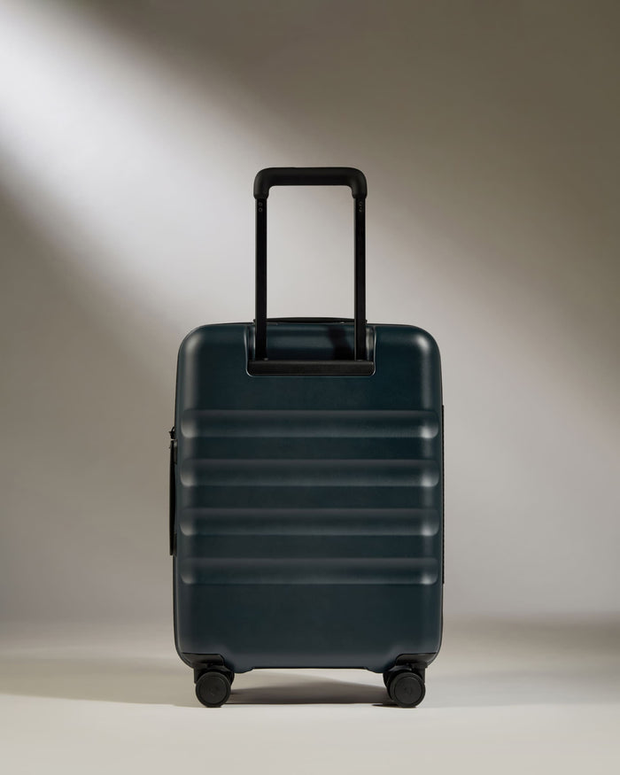 a suitcase with handle on wheels
