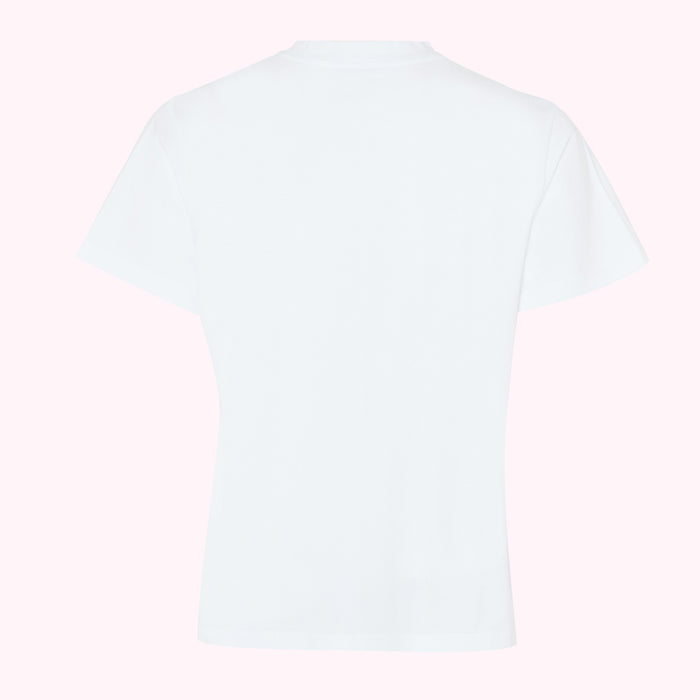 Back view of a plain white short-sleeved t-shirt on a pink background.