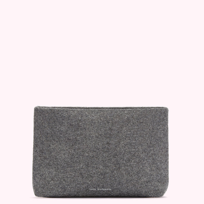 Grey felt Lulu Guinness pouch on a white background.