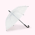 A translucent white umbrella with a black handle and a subtle pattern.