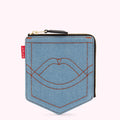 Light blue denim zipper pouch with a stitched pocket design and a red logo.
