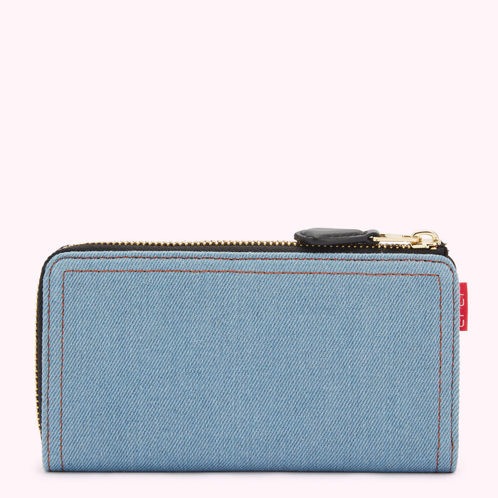 Light blue denim zip-around wallet with black zipper and red label.