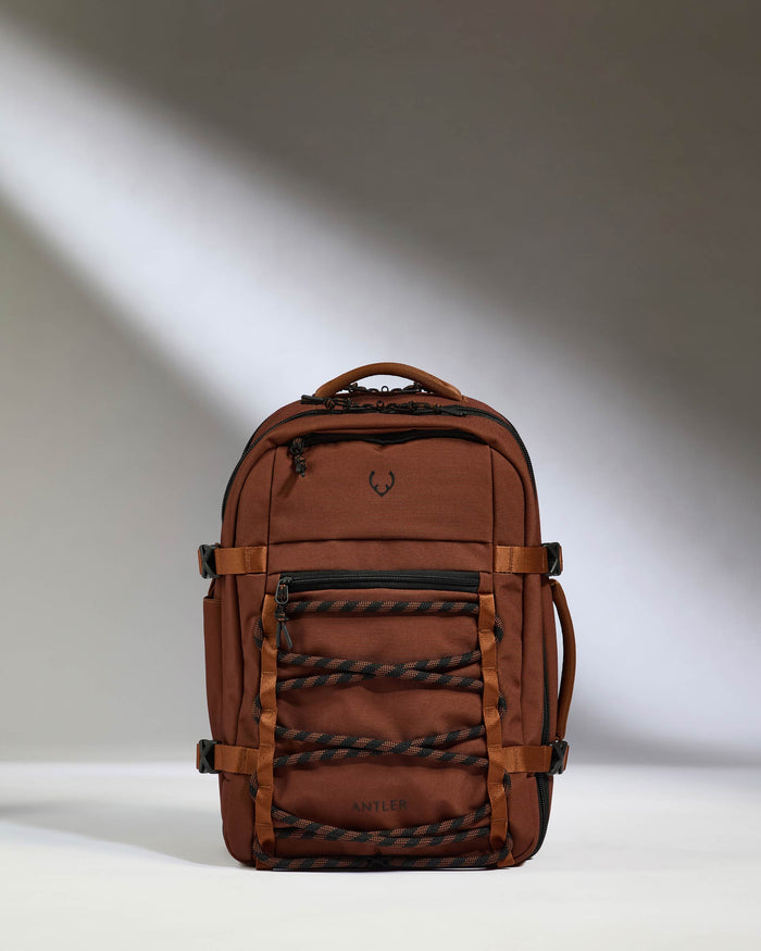 a brown backpack with black straps