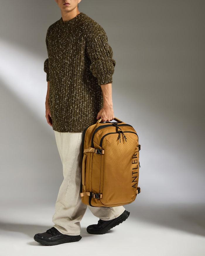 a man holding a suitcase