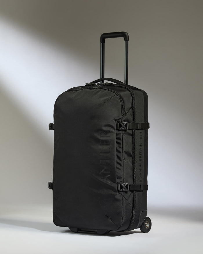 a black suitcase with wheels