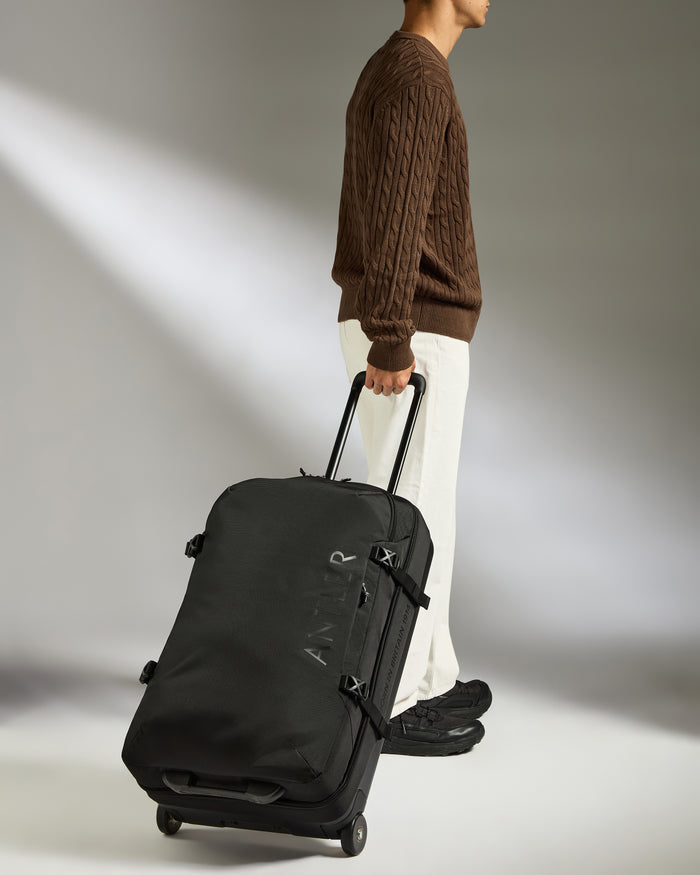 a man with a suitcase