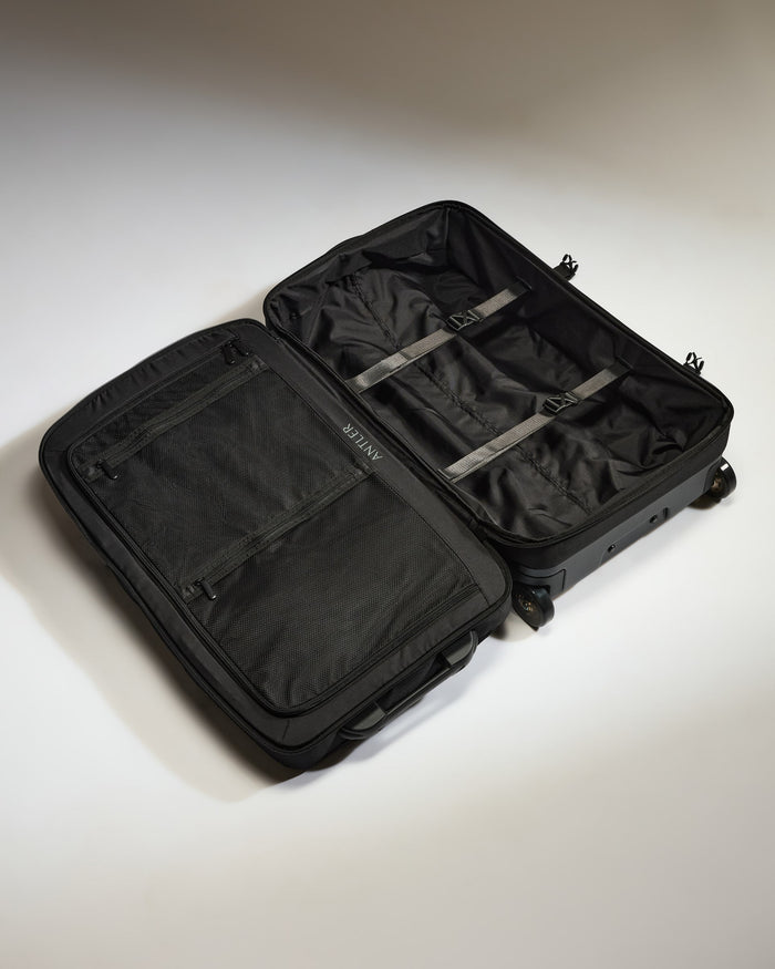 a black suitcase with wheels