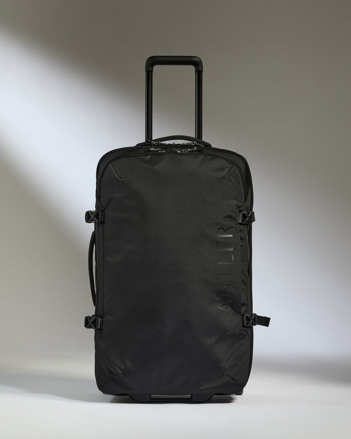 a black suitcase with handle