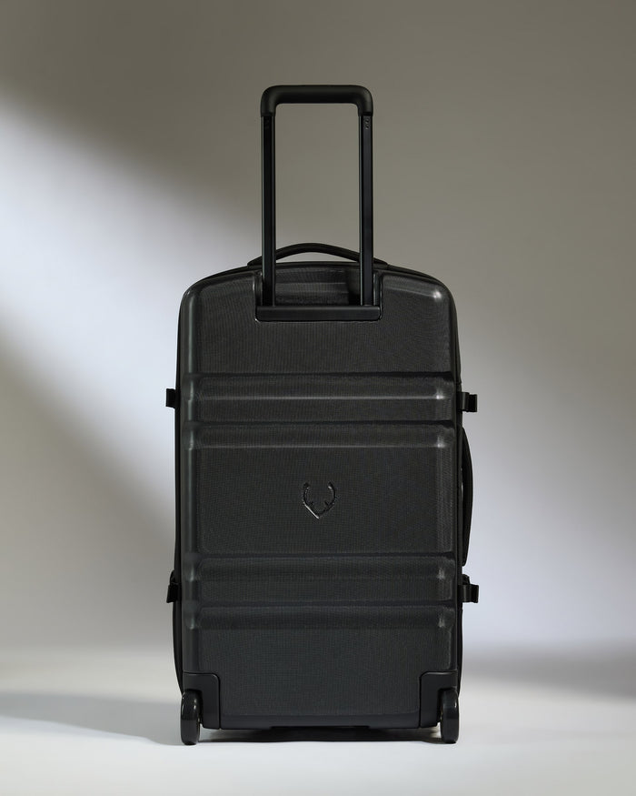 a black suitcase with handle