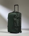 a green suitcase with wheels