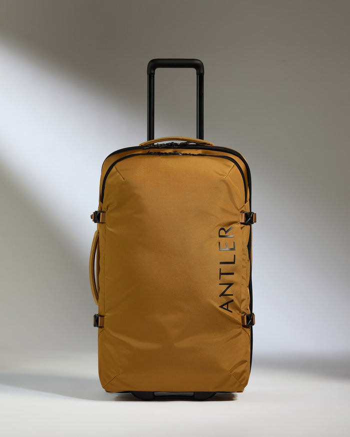 a brown suitcase with handle