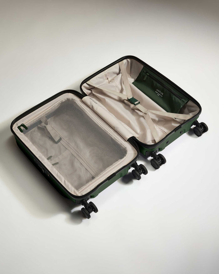 a suitcase with wheels and a mesh inside