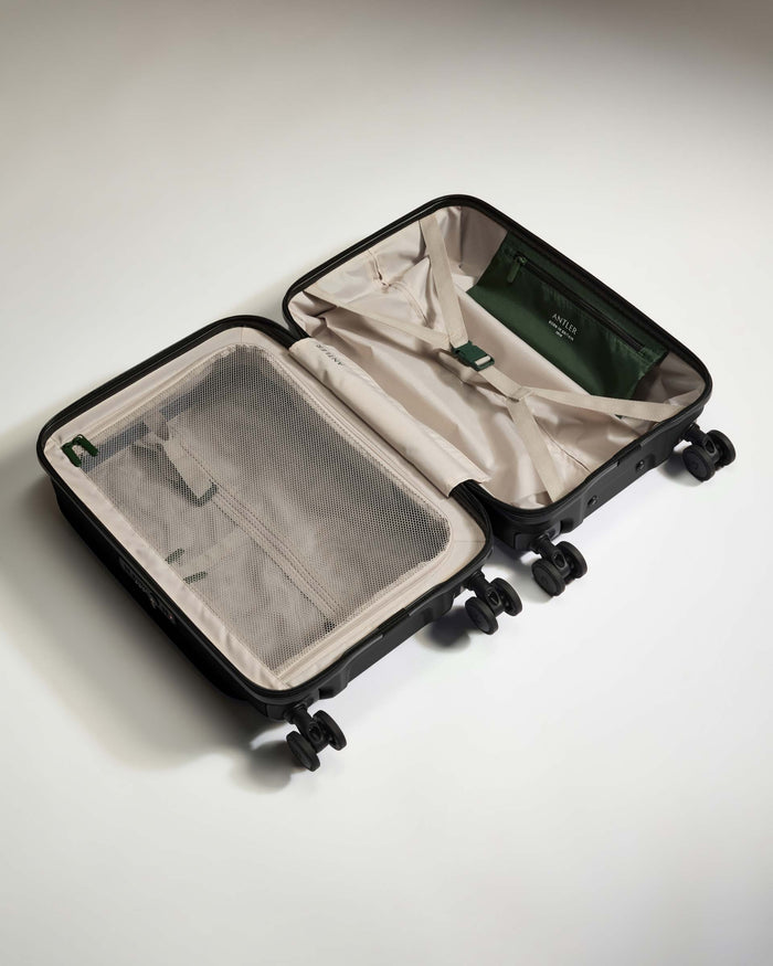 a suitcase with wheels and a transparent inside