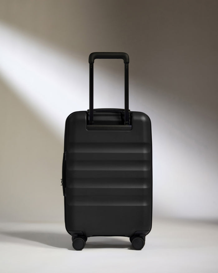 a black suitcase with wheels