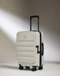 a white suitcase with wheels