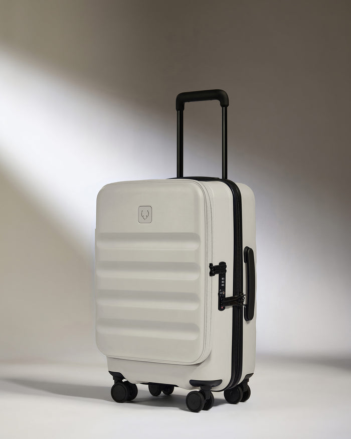 a white suitcase with wheels