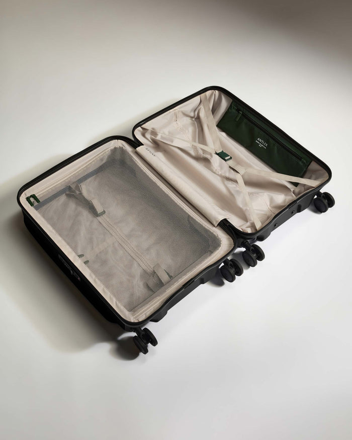 a suitcase with wheels and mesh inside