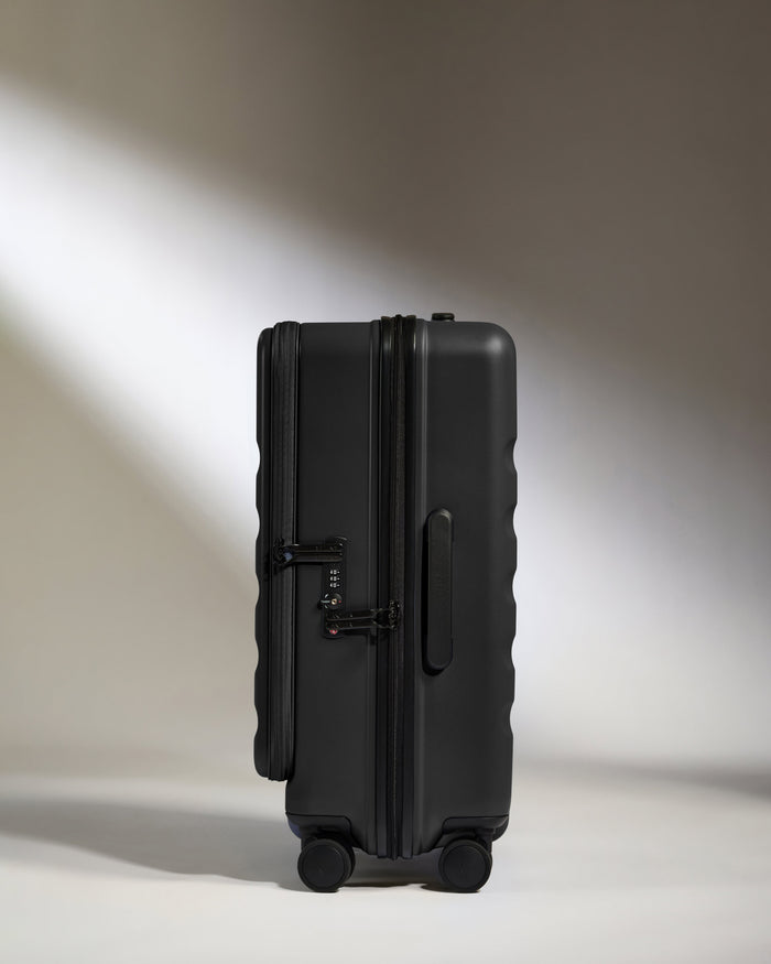 a black suitcase with wheels