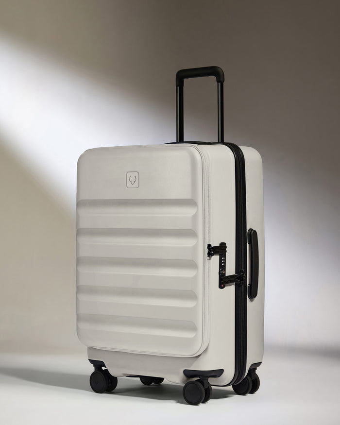 a white suitcase with wheels