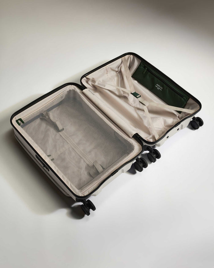 a suitcase with a net inside