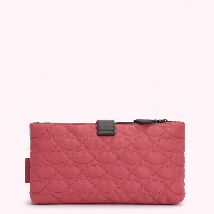 Pink quilted cosmetic bag with black zipper and clasp.