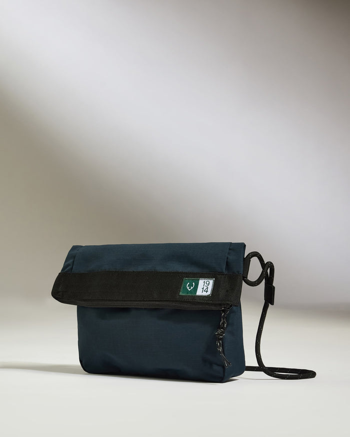 a blue bag with a strap