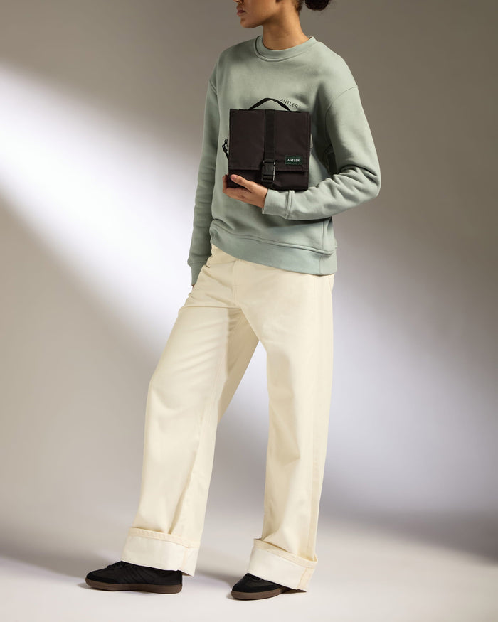 a man holding a briefcase